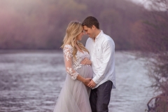 Maternity photography couple at the river